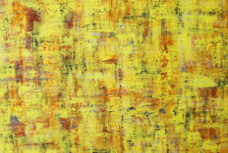 Abstract painting in bright yellow with a finely textured and mottled surface with specks of different colors running across it